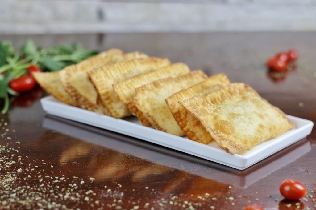 Porção de pastéis